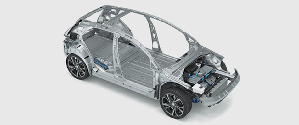 3D simulation of an electric car chassis frame showing metal body and blue wire harness with electric motor.