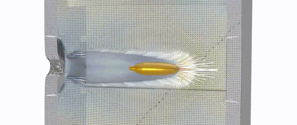 Simulation of a bullet passing through a water tank.