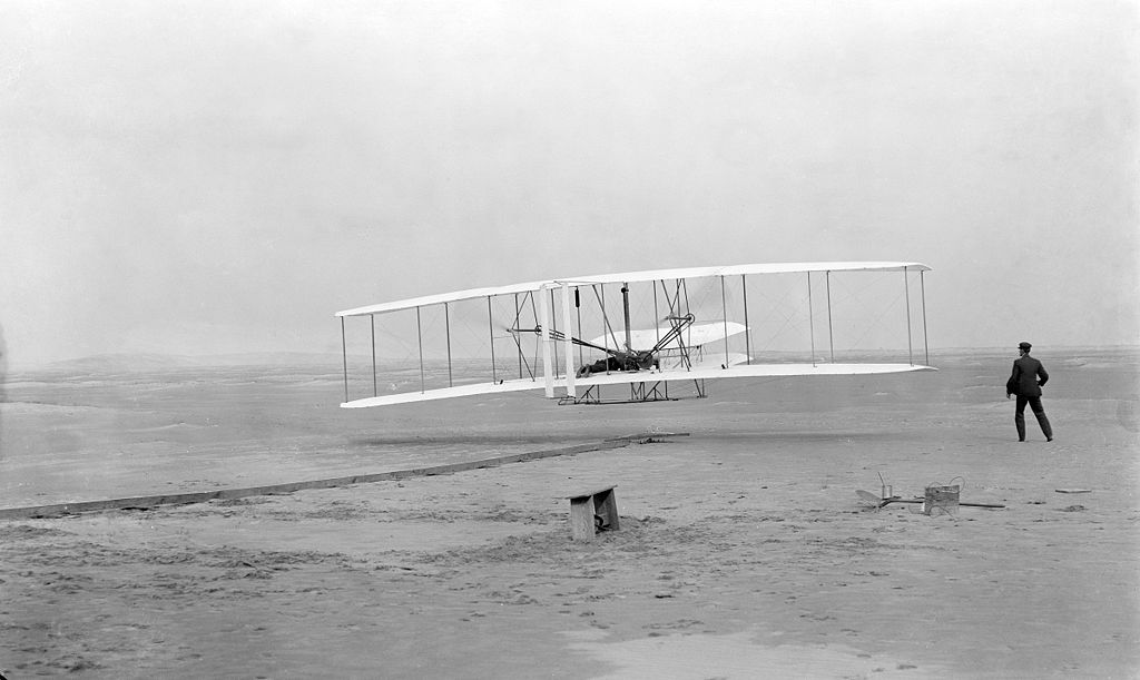First successful flight of the Wright Flyer. The machine traveled 120 ft. in 12 seconds at 10:35 AM at Kitty Hawk, North Carolina, 1903.